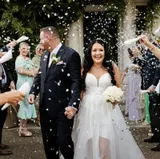 Bride and groom celebrated with confetti